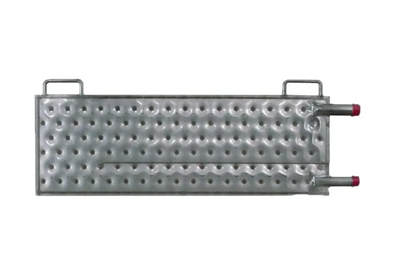 Immersion heat exchanger coils in industrial vessel
